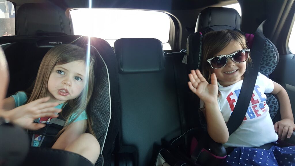 Lilah and Norah riding in the car