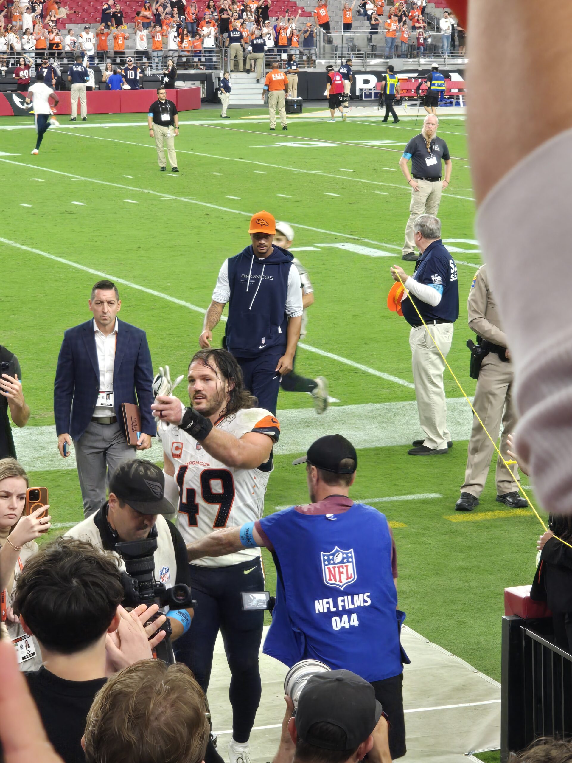 Broncos player waving to fans by the tunnel after the win